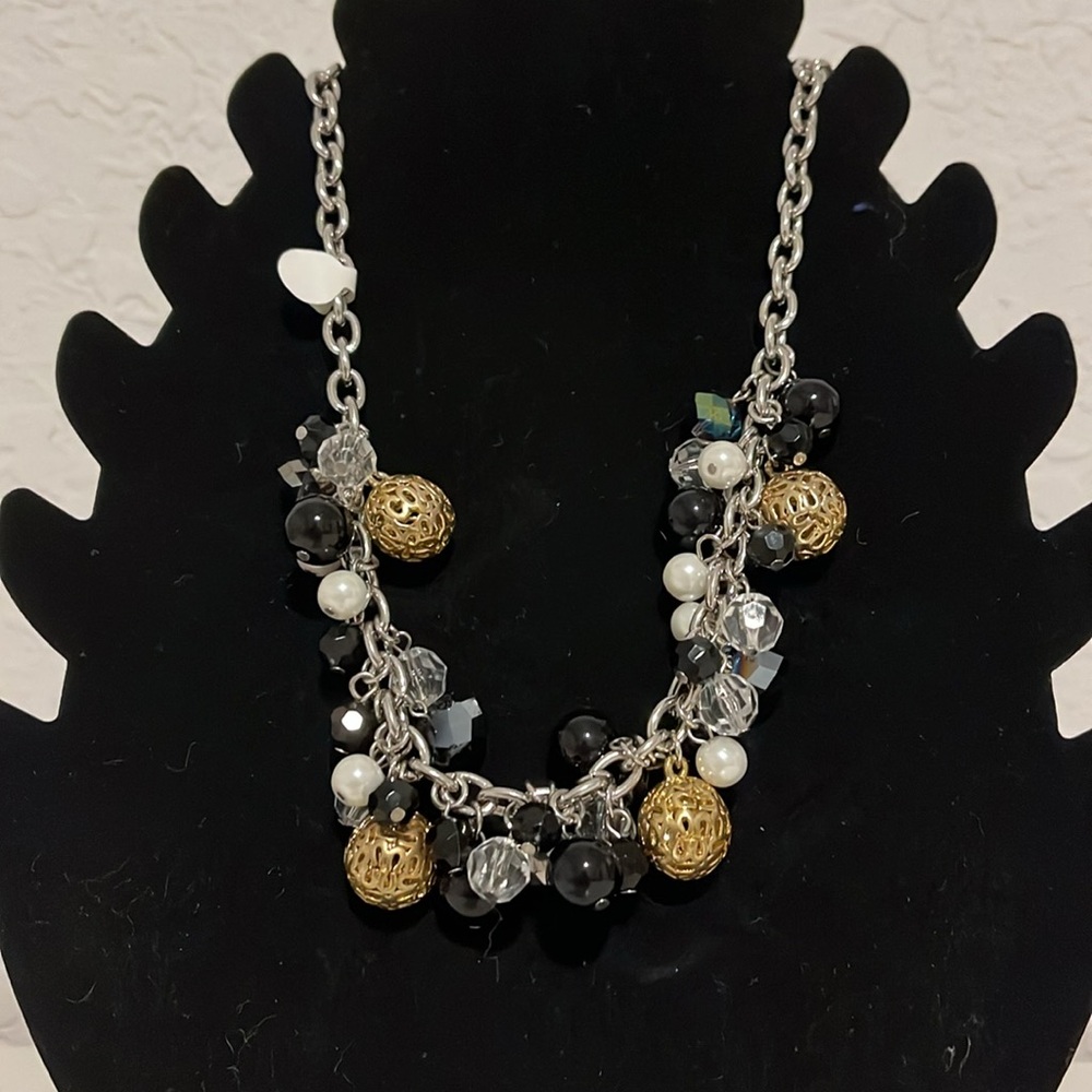 Cyber Sale $35   Coach. 2 Set Piece, Rodium Silver , black and gold.
